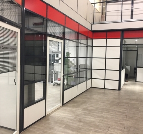 Office partitions on 2 levels incorporated into a mezzanine
			