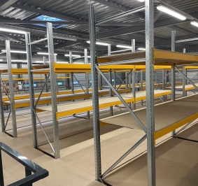 No authorization - Alt: Novopan tablet overlays on warehouse racks
			