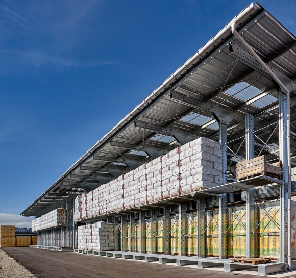 Pallets stored on cantilever racks with gratings and canopy